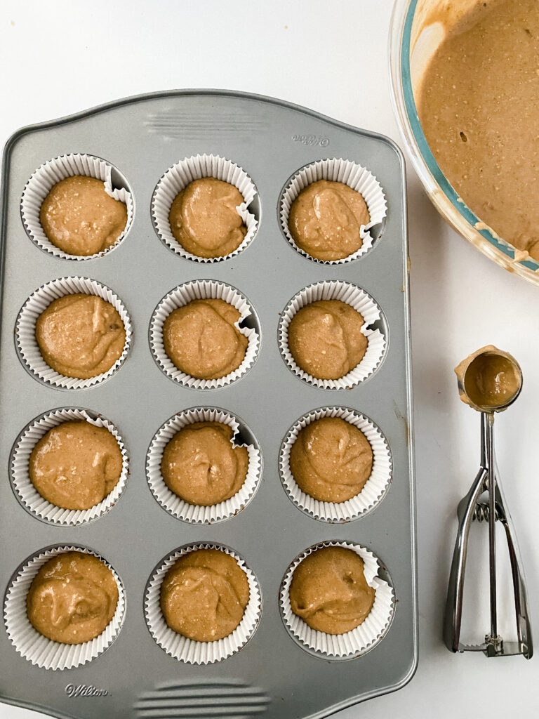 Apple cider cupcakes ingredients on white counter
