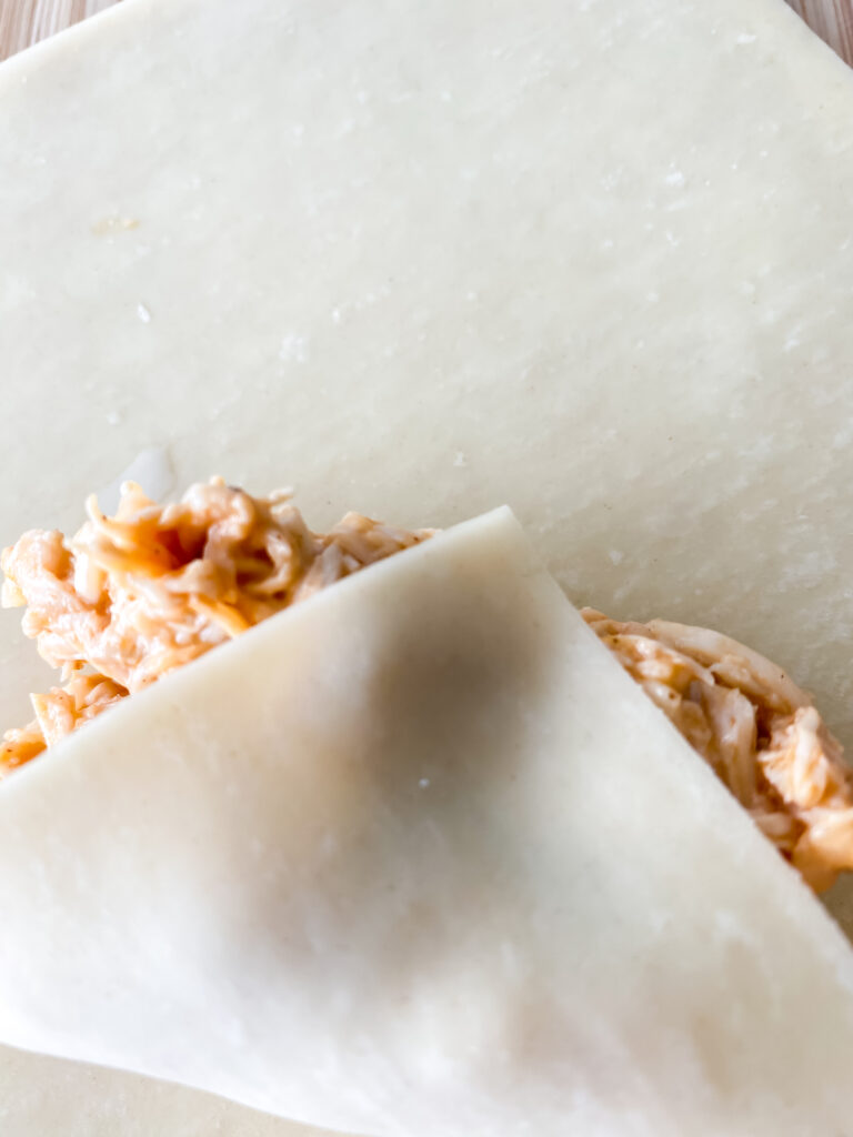 a guide to wrapping an egg roll at www.chefkimihou.com