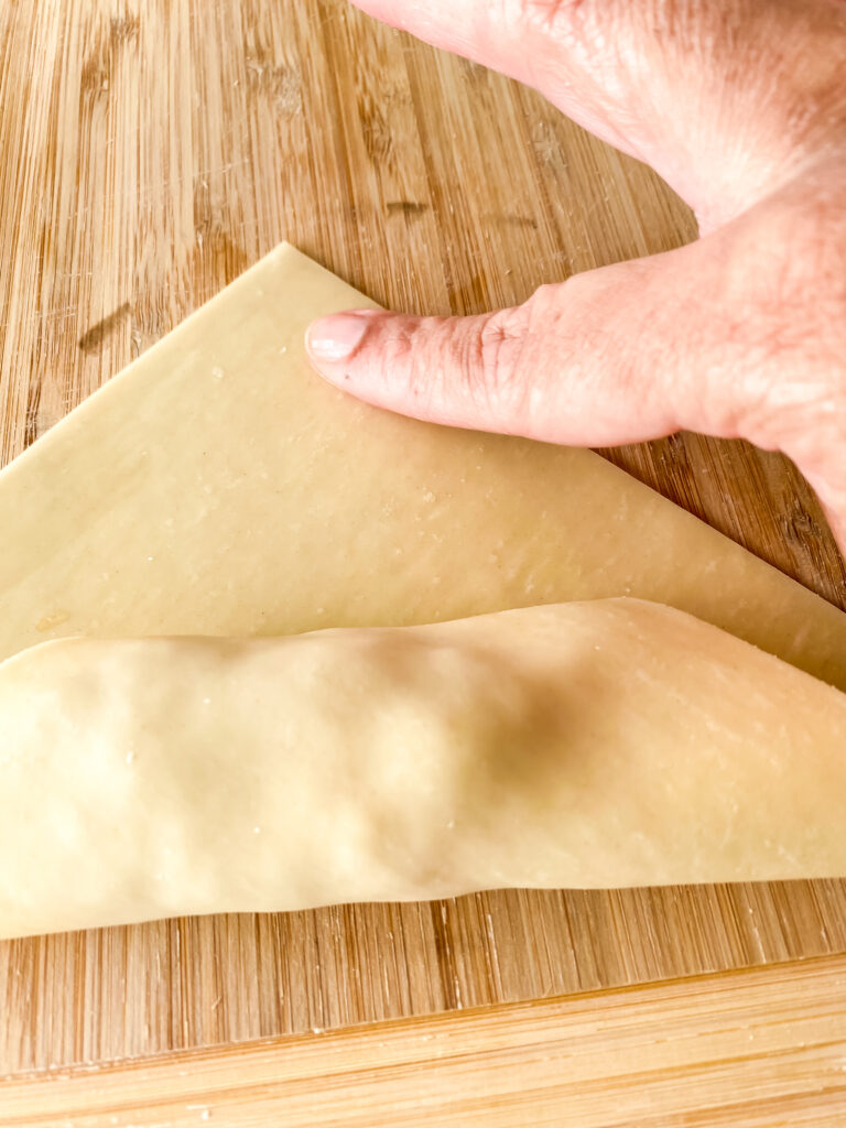 a guide to wrapping an egg roll at www.chefkimihou.com