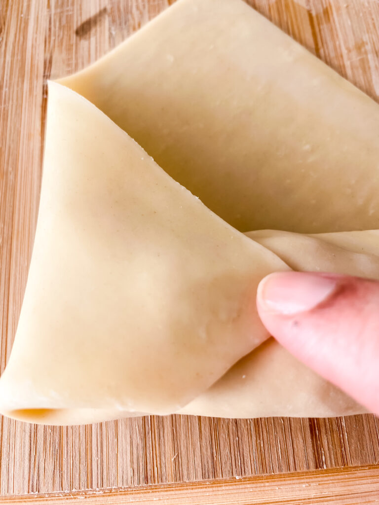 a guide to wrapping an egg roll at www.chefkimihou.com